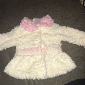 Fuzzy white and pink coat